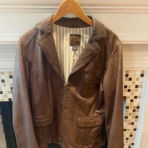 100% leather brown jacket.